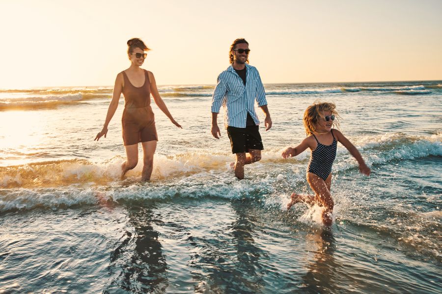 Family enjoying the beach in Florida Beach Town