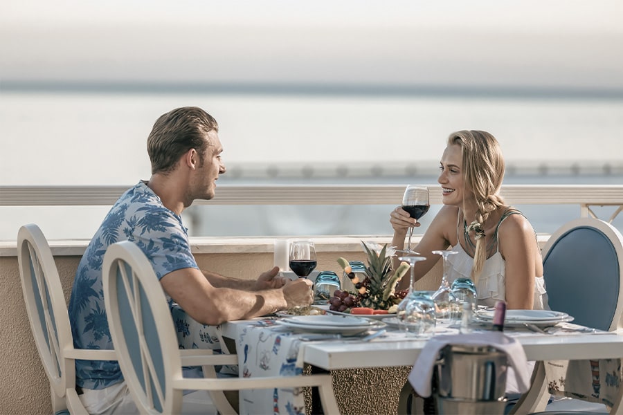 couple at restaurant on the satellite beach waterfront